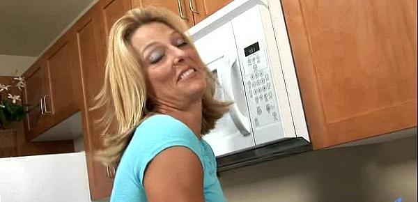  Busty Anilos Brenda James rides a dong on kitchen floor